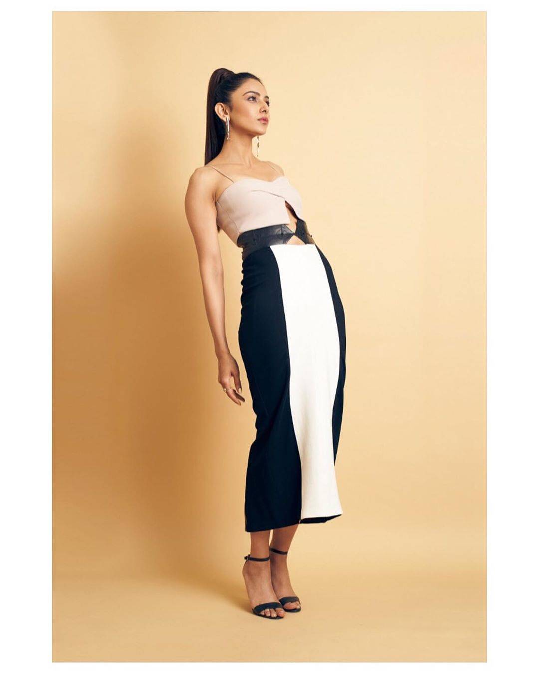 Here, we see the NGK actor pair a retro looking Sameer Madan skirt with a very modern bralette from Babita Malkani. - Fashion Models