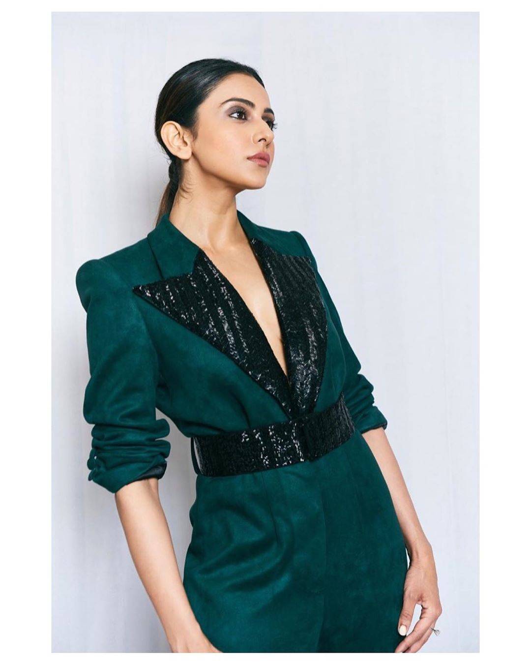 The jumpsuit from Nauman Piyarji has the waist and wide lapels in black sequins and the NGK actor wore no shirt underneath  - Fashion Models
