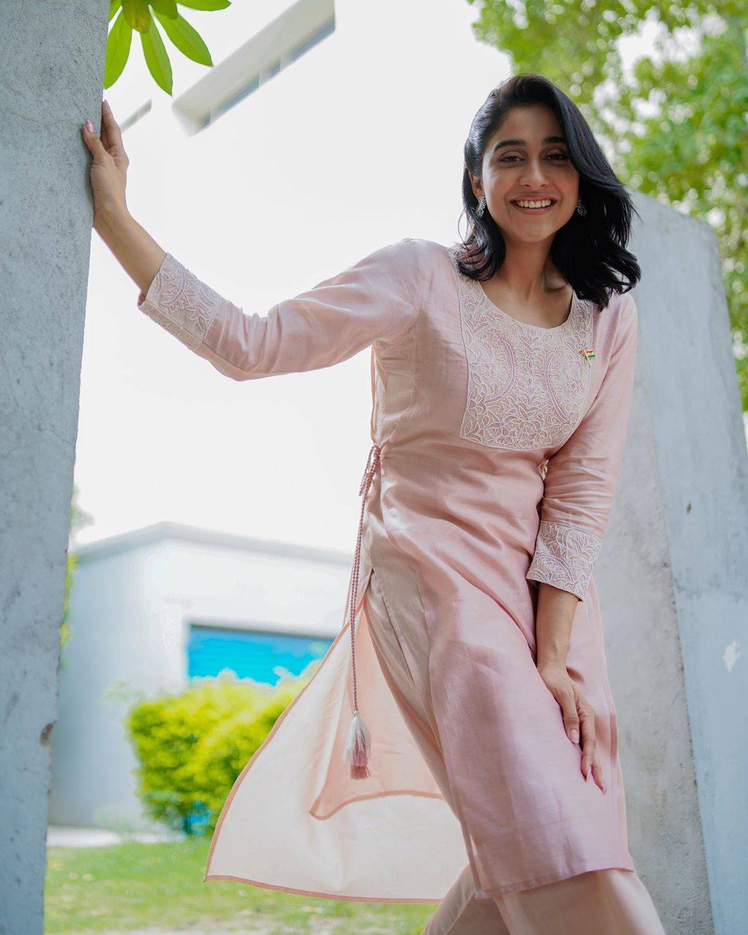 Regina Cassandra has stepped out today in this muted rose kurtha ensemble from Kanika Sharma which has subtle intricate embroidery panels that we love! - Fashion Models
