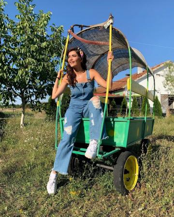 Hindi television sweetheart Karishma Tanna recently posted some pictures where she looks ready for a day's work in a pair of distressed dungarees from Freakins 2 - Fashion Models