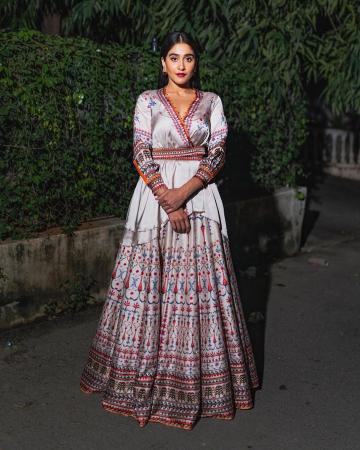 The asymmetrical angraka kurta from Rajdeep Ranawat and the matching skirt has detailed, ethnic multicolour prints - Fashion Models