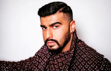  Arjun Kapoor is currently trying out a haircut that, in our opinion, is too short for him. We hope the changing climate will make him grow a mane towards the year-end - Fashion Models
