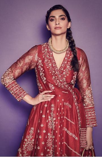 The kurta has an angrakha tie, intricate floral-inspired designs and a flowy skirt that goes down in full pleats - Fashion Models