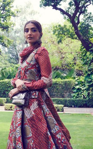 Our fashion icon, Sonam Kapoor, was recently spotted in an ethnic gypsy-inspired outfit from Rajesh Pratap Singh in a red-brown scheme - Fashion Models