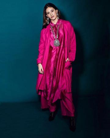 If you see this slightly shiny solid pink collar, coat and flared palazzo ensemble in a store, you may skip it. But look how well stylist  Megan Concessio has accessorised to redeem the outfit! - Fashion Models