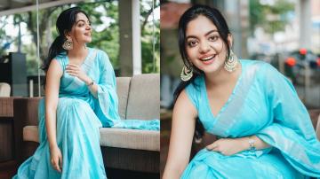 Graceful Ahaana Krishna looking bright in sky blue saree