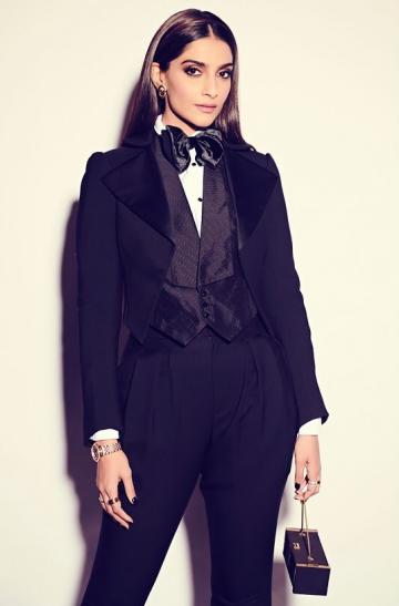The black suit from Ralph Lauren with triangular lapels and a cute waist coat works for us - Fashion Models