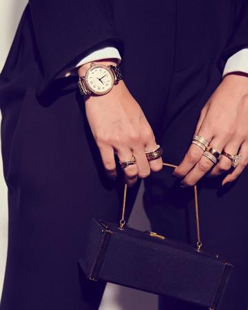 The clutch is a swag number. The watch from IWC Schaffhausen is another fine addition, so are the rings from Diamantina - Fashion Models