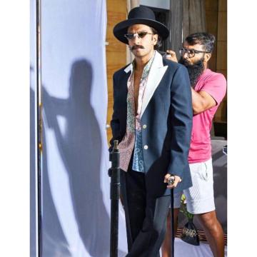 The top hat is a fun statement, with  Ranveer's hair curling under it - Fashion Models