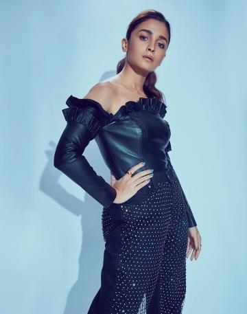 Alia Bhatt graced the Mumbai Film Festival in this off-shoulder leather black outfit from Osman - Fashion Models