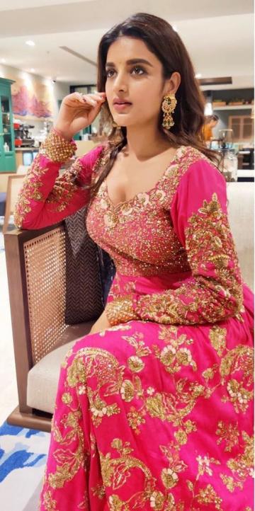 Nidhhi Agerwal was seen in this rather tackily embroidered churidar from Shyamal Bhumika - Fashion Models