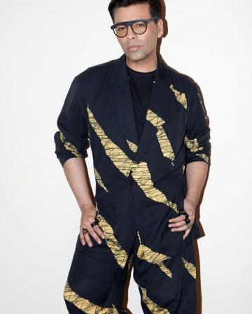 Karan Johar, the prime debonaire of Bollywood for the past several years, has given us a suit we truly hate - Fashion Models