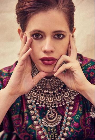 There are two chunky necklaces, a turquoise work chain and a pendant chain adding features around Kalki's neck - Fashion Models