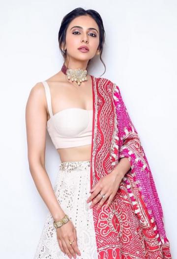 Rakul Preet was seen at the Diwali bash arranged by Bollywood producer Ramesh Taurani in this white lehenga and printed shawl ensemble - Fashion Models