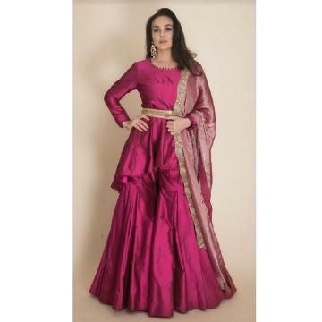 The Manish Malhotra flavour of charm is visible in this outfit - a rich pink accentuated by gold waist belt and a refreshing burnt pink colour shawl - Fashion Models