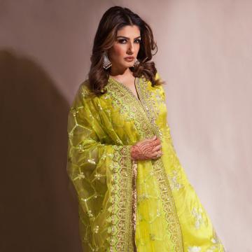 Raveena Tandon is in Pune for Diwali and was spotted in this lime green embroidered salwar set from Gopi Vaid - Fashion Models
