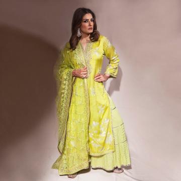 The kurta with a deep V neck is paired with a lighter flared palazzo with a heavy embroidery shawl thrown on top - Fashion Models