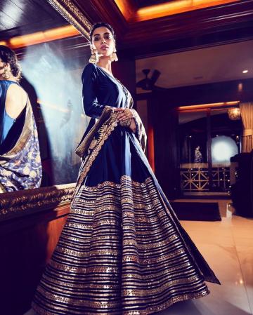 The dress has a thick band of rich embroidery that looks just splendid! - Fashion Models