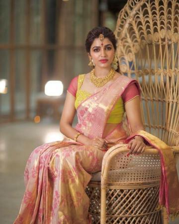 Stylist-designer Swapna Reddy added some green to add relief, but we feel it undermines the beauty of the saree, which has s superior quality of embroidery - Fashion Models