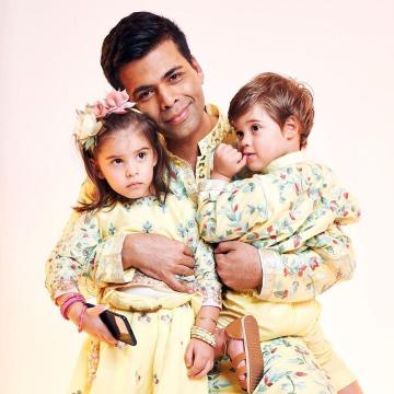 Little Miss Johar has a hairband inspired by the outfit and cute yellow and pink bangles - Fashion Models