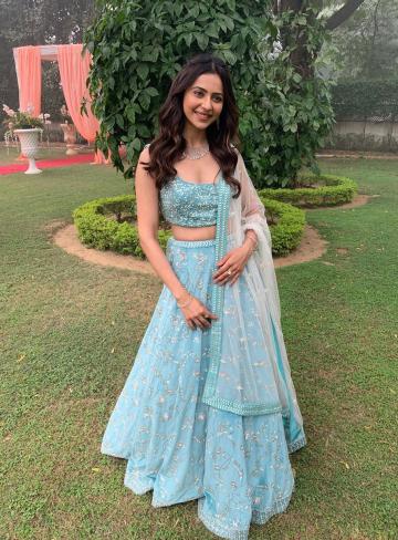 Rakul looks like the-girl-next-door-dressed-up, with the colour of the outfit and the sparse jewellery making it charming - Fashion Models