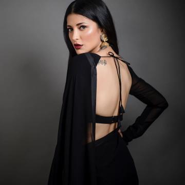 The makeup is goth-inspired and sharpens Shruthi's piercing features even more - Fashion Models