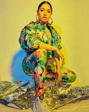 The pantsuit from Papa Don't Preach is floral and playful in a bright bevy of colours - Fashion Models