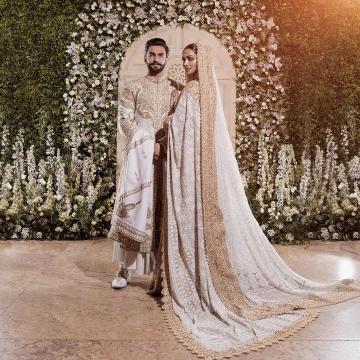 They had a second reception at Grand Hyatt in Mumbai, for which Deepika decked up in a white heavily embroidered saree and matching jewellery from Abu Jani Sandeep Khosla - Fashion Models