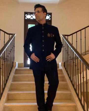 Karan Johar, who is hosting the 2019 International Film Festival of India at Goa, was spotted on day-1 in this dapper suit from Shantanu and Nikhil - Fashion Models