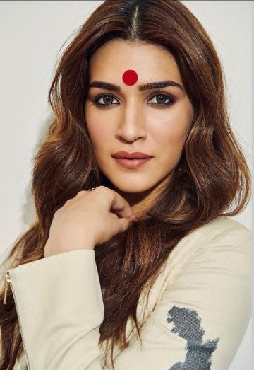 What makes, and almost overshadows this look is the huge bindi that Kriti has on - Fashion Models