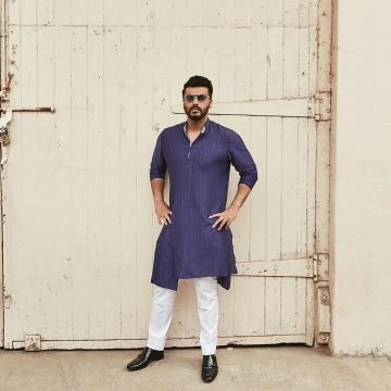 Arjun Kapoor was recently spotted in this plain but comfortable looking asymmetrical Kurta from Raghavendra Rathore - Fashion Models