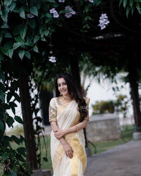 We especially love this traditional looking saree from the label, Mangalya Kasavu - Fashion Models