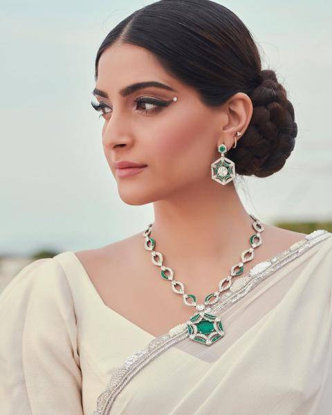 We're loving the white and green jewellery from Bulgari, which is the life of this look - Fashion Models
