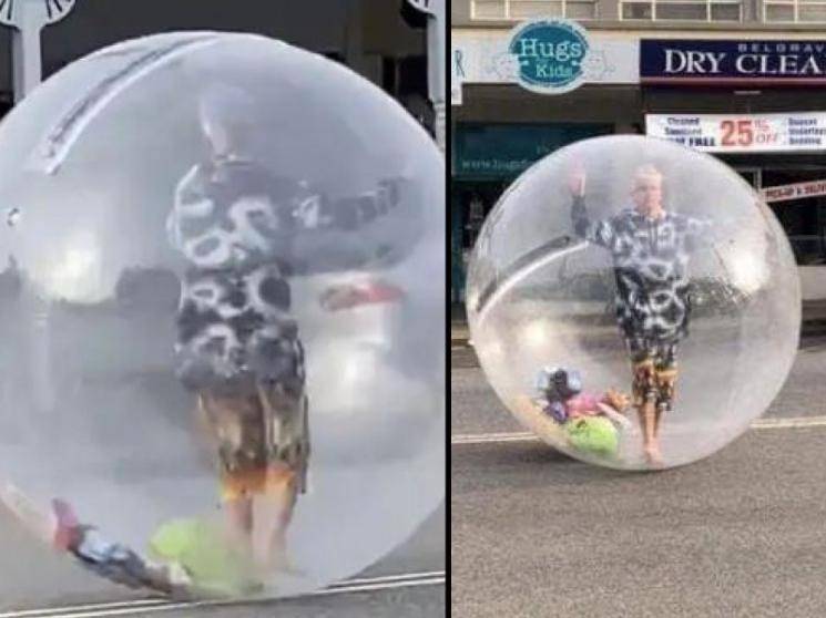 Melbourne man walks around in plastic bubble as protection against COVID-19